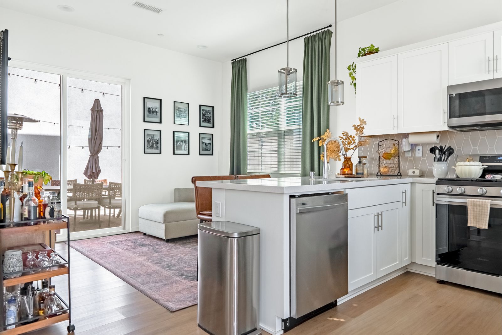 Open kitchen and living area with patio doors